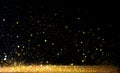 Glitter vintage lights background. gold and black. de focused Royalty Free Stock Photo