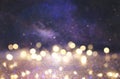 glitter vintage lights background. silver, black, purple and gold. de-focused. Royalty Free Stock Photo