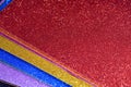 Glittered colorful Eva foam sheets, colored cardboard, rubber pad, sponge papers for school arts and crafts, pile of multicolored