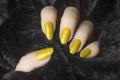 Glittered yellow nails manicure