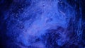 Glittering Blue Particle Background. Universe blue dust with stars on black background. Motion abstract of particles.