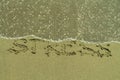 Wave erasing word Stress from the sand