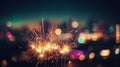Glittering burning sparkler with multicolor defocused night city background.