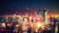 Glittering burning sparkler with multicolor defocused night city background.