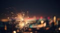 Glittering burning sparkler with multicolor defocused night city background.