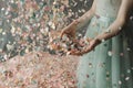 Glittering confetti rain in a pastel color palette, creating a dreamy and whimsical atmosphere