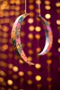 Glittering Crescent Moons on Colorful Background