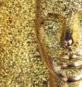 Glittering, golden head of a mannequin