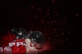 Glittering mirror disco ball, gifts and  hearts. Valentine`s Day. Holiday party. Entertainment, disco, music show background Royalty Free Stock Photo