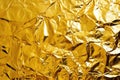 glittering pattern of crumpled gold foil