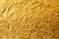 glittering pattern of crumpled gold foil