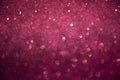 Glittering pink background, abstract sparkling lights, elegant festive glowing shining texture