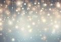 Glittering silver stars suspended against a soft blue bokeh background Royalty Free Stock Photo