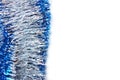 Glittering silver tinsel for Christmas tree decoration isolated on white. Christmas background for textan white background. Multi- Royalty Free Stock Photo