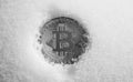 Crypto currency silver bitcoin on glittering snow