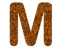 Glittery brown letter M on a white isolated background