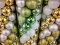 Glittery gold and green Christmas ornaments