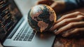 Global business, hands holding globe, laptop, coding, office