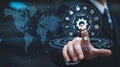 Global Business Technology Man Interacting with Digital World Map and Icons Royalty Free Stock Photo