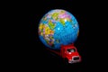Global Cargo Transport Concept, globe and cargo truck Royalty Free Stock Photo