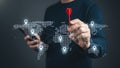 Global connectivity concept with dotted world map, location pins, and a red dart pointer Royalty Free Stock Photo