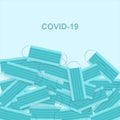 Global COVID-19 epidemic. Pile of medical masks on blue background, creative illustration