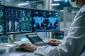 Global Data Monitoring: A Scientist Analyzing Complex Datasets on Multiple Screens Royalty Free Stock Photo
