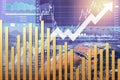 Global Economic growth background with candlesticks chart and golden bar graph show arrow up symbol of successful data for Royalty Free Stock Photo