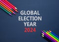 Global election year 2024 symbol. Concept words Global election year 2024 on beautiful black paper. Beautiful black background.