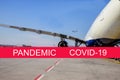 Global pandemic with coronavirus COVID-19The turbine the aircraft plane is preparing to fly at the airplane on the runway airport Royalty Free Stock Photo