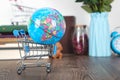 Global shopping concept on table Royalty Free Stock Photo