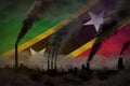 heavy smoke of industry pipes on Saint Kitts and Nevis flag - global warming concept, background with space for your logo -