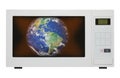 Global warming - earth in microwave Royalty Free Stock Photo