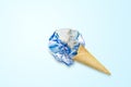 Global Warming and Pollution Concept : Ice cream planet earth melting on blue background. Royalty Free Stock Photo