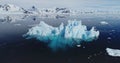 Global warming problem: iceberg melting at polar ocean bay aerial. Nature preserve and environment Royalty Free Stock Photo