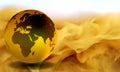 Globe with yellow smoky Background. Royalty Free Stock Photo