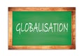GLOBALISATION text written on green school board