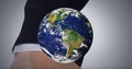 Globe against close up of hand of businessman against grey background