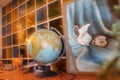 Globe on the background of a glass wall Royalty Free Stock Photo