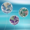 Globe balloon in the sky. Photocomposition with image from NASA