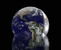 Planet earth and reflection Royalty Free Stock Photo