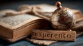 Globe and Books on Table with Esperanto Inscription Royalty Free Stock Photo