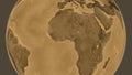 Globe centered on Togo neighborhood. Sepia elevation map Royalty Free Stock Photo