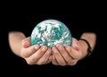 Globe in child hands. save of earth Royalty Free Stock Photo