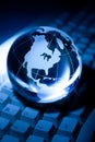 Globe and Computer Keyboard Royalty Free Stock Photo