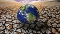 The globe disappears into the cracked barren land as the effects of global warming