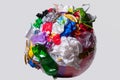 A globe of the earth with trash over white background, the concept of ecology problem