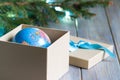 Globe in gift box. Travel gift for Christmas concept Royalty Free Stock Photo