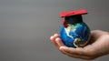 The globe with graduation cap.AI generated image Royalty Free Stock Photo