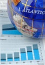 Globe and graph of economy Royalty Free Stock Photo